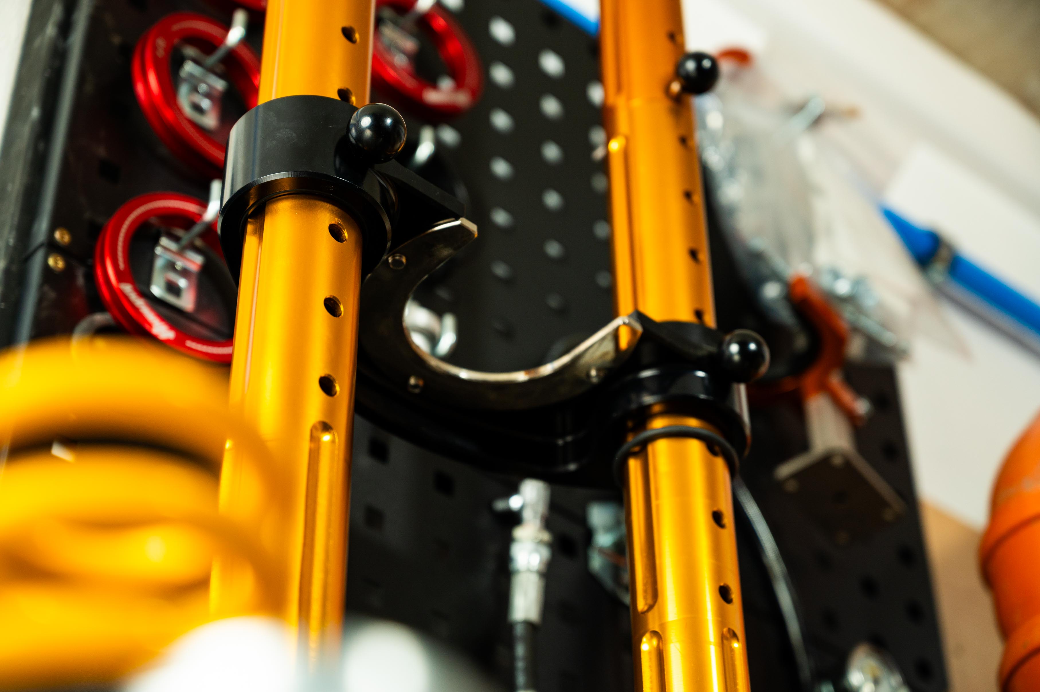 Shock absorber service including adjustment